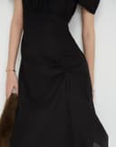 Đầm lửng rút nhún tay phồng