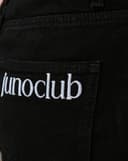 Quần jean lai tua rua túi thêu chữ "Junoclub"