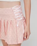 Chân váy xốp nổi hoa văn xếp ly