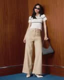 Áo dệt kim cổ polo thêu chữ