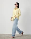 Áo sơ mi thêu logo